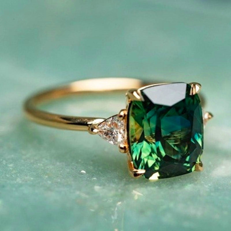Smaragdgrüner Zirkonia-Ring in Gold