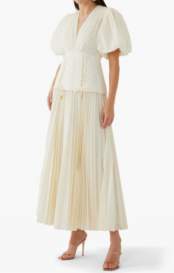 Frieda – Plissiertes Taillenkleid mit Puffärmeln